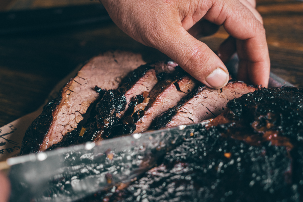 a close up of brisket being sliced